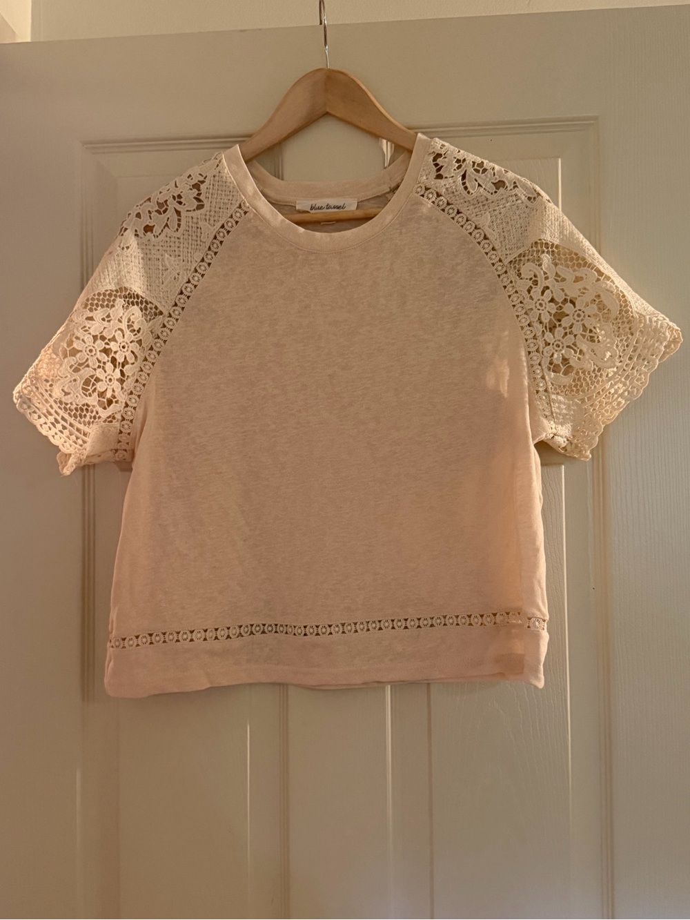 Short Sleeve Lace Detail Tee in beige. Blue tassel brand. Size M